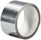 A roll of silver adhesive tape with a reflective surface, photographed slightly at an angle, shows its shiny exterior.
