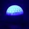 A blue light with a hemispherical design emits a soft, patterned light, creating a soothing atmosphere.
