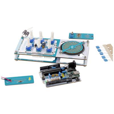 Electronic kits with various sensors and circuit boards, including speakers and LEDs. Used for DIY electronics projects.
