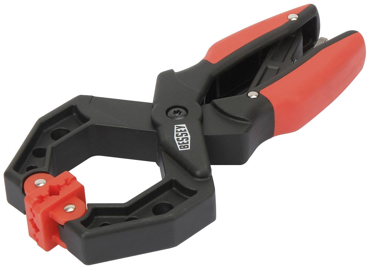 A black and red plastic clamp on a white background. It is used for holding workpieces during machining.