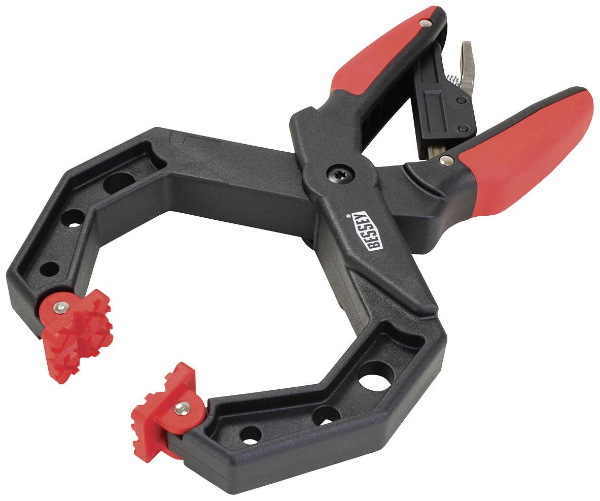 A black and red BESSEY clamp with a gripping mechanism, used for holding materials in workpieces.