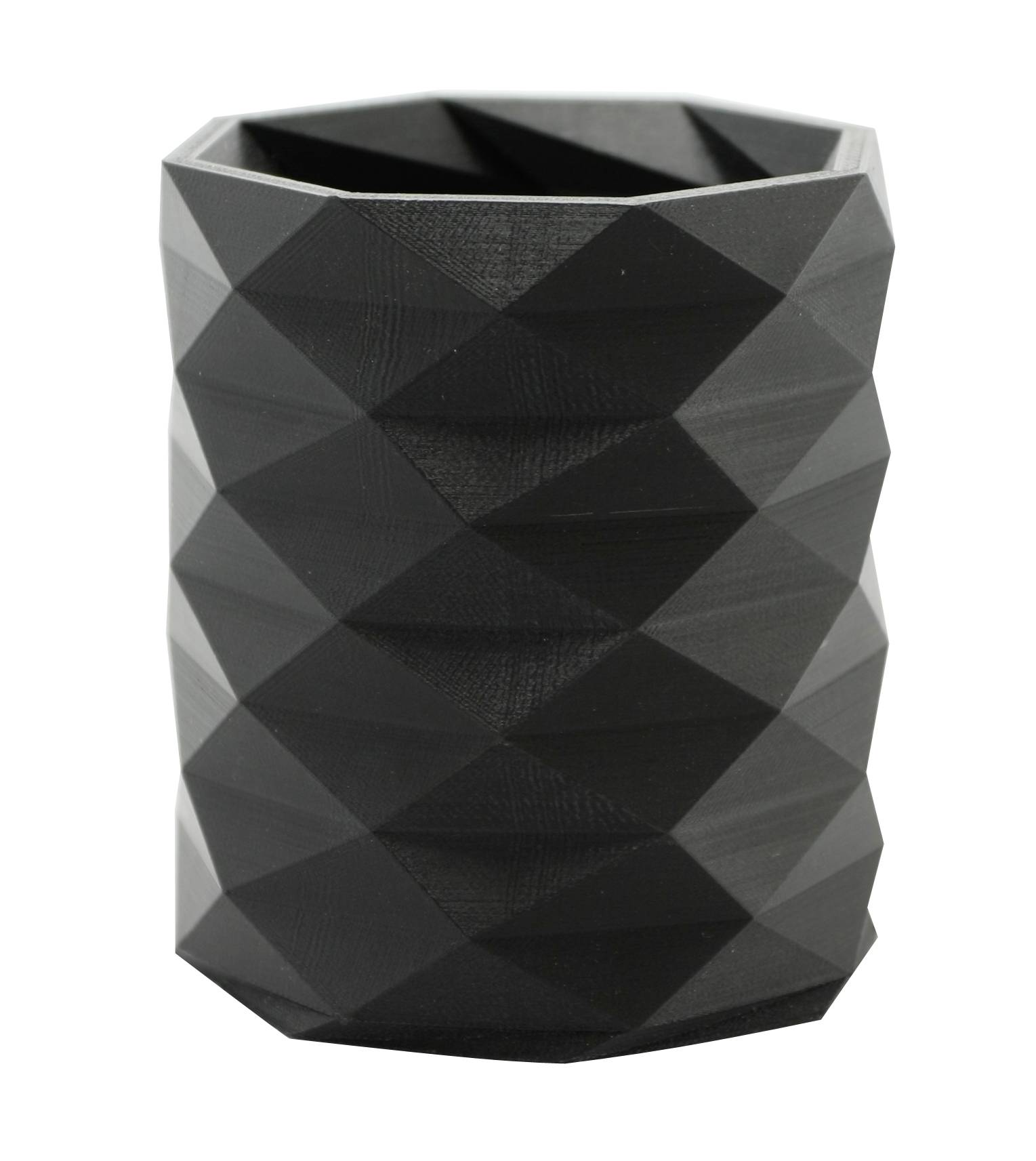 Black, faceted pencil holder with a geometric pattern, suitable for storing writing utensils on a desk.