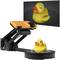 Yellow plastic duck bird being captured by a 3D scanner. The scanned 3D model is visible on the screen.