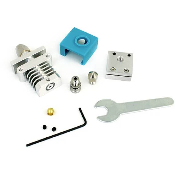 A 3D printer hotend kit with a heatsink assembly, nozzles and tools, including a spanner, for replacement or installation.