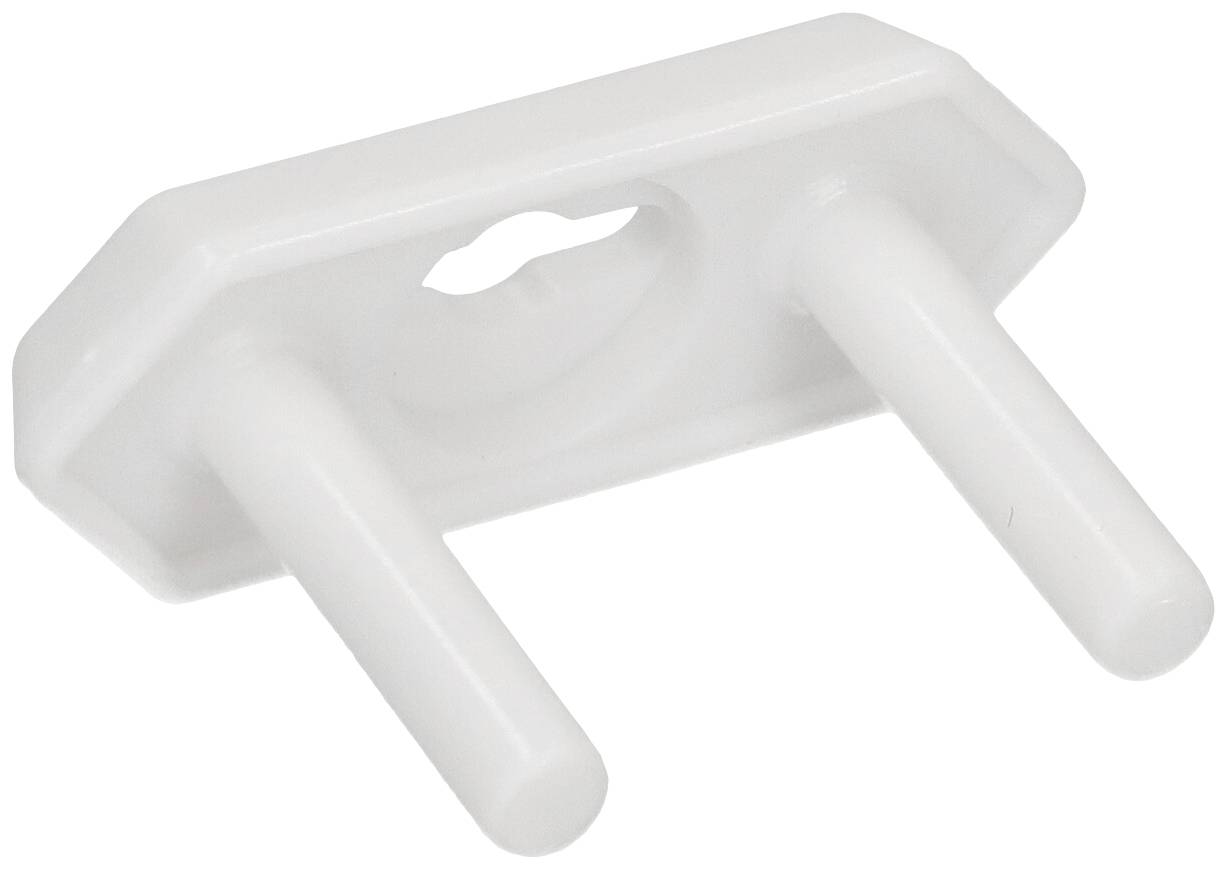 White plastic socket covers designed to protect children from electrical shock.