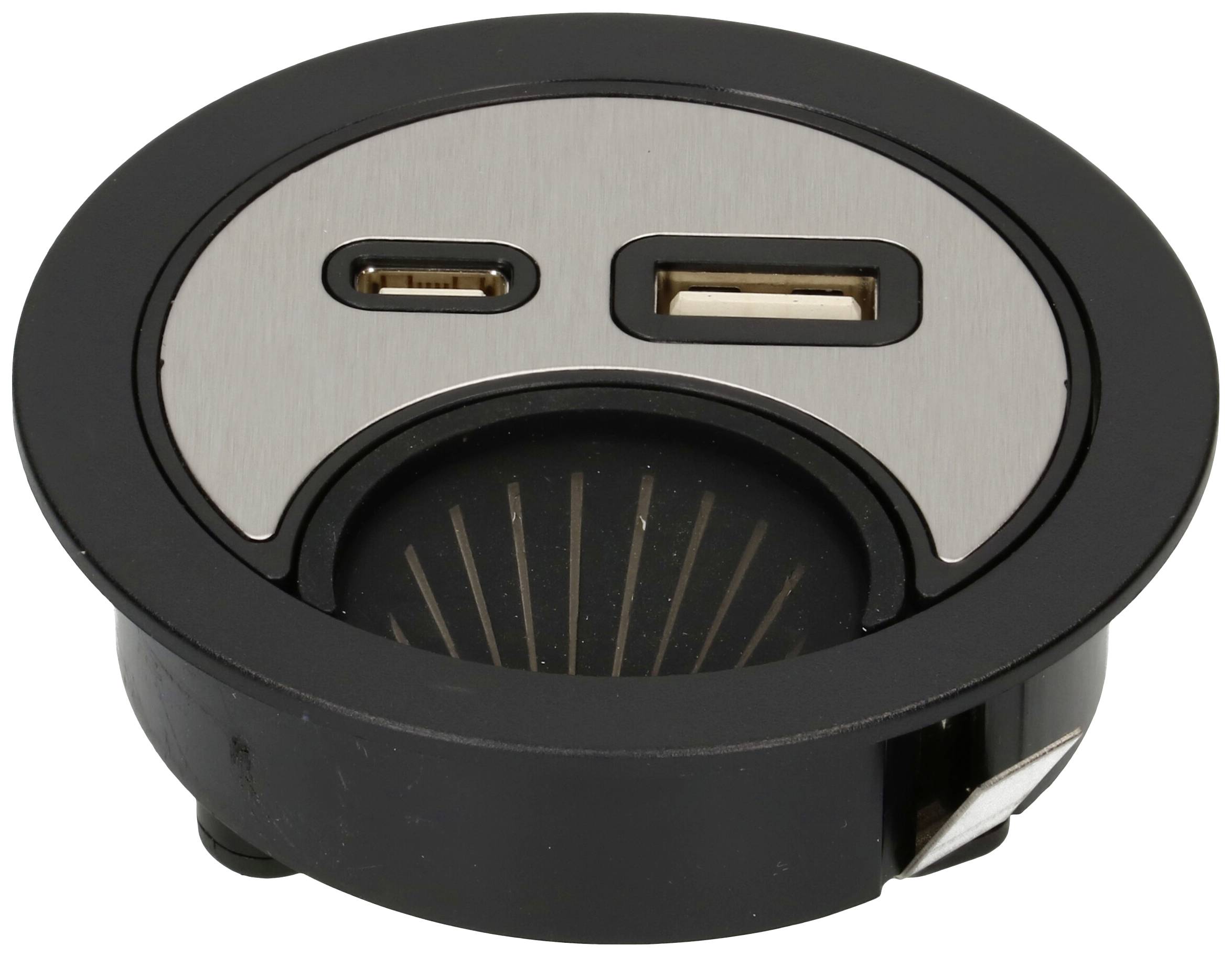 Round desk cable grommet with USB and USB-C ports and storage compartment in black finish.