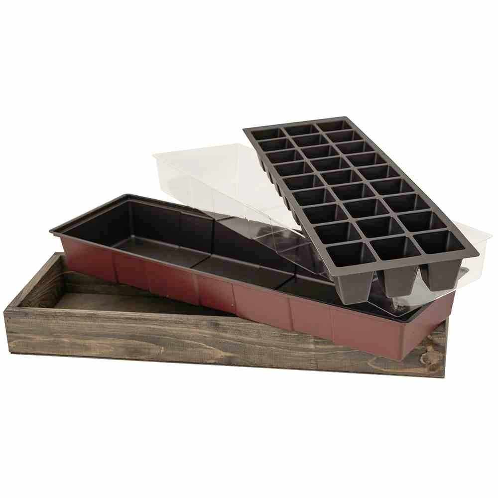 A set of seed trays with transparent covers, perfect for seed germination. Includes black inserts with square compartments.