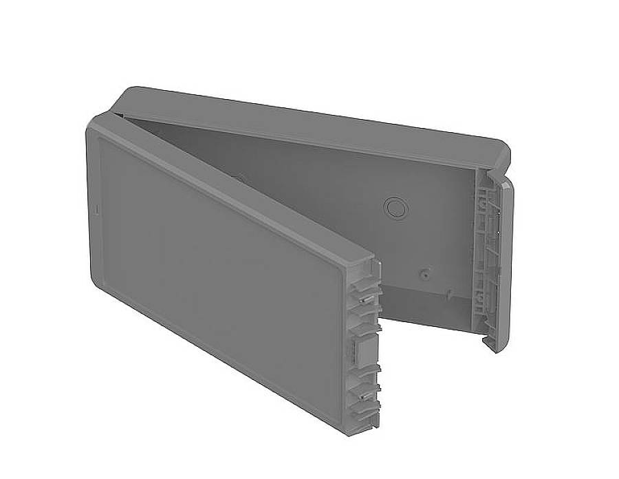 An open, rectangular grey plastic enclosure, possibly a protective or storage container, can be seen in the image.