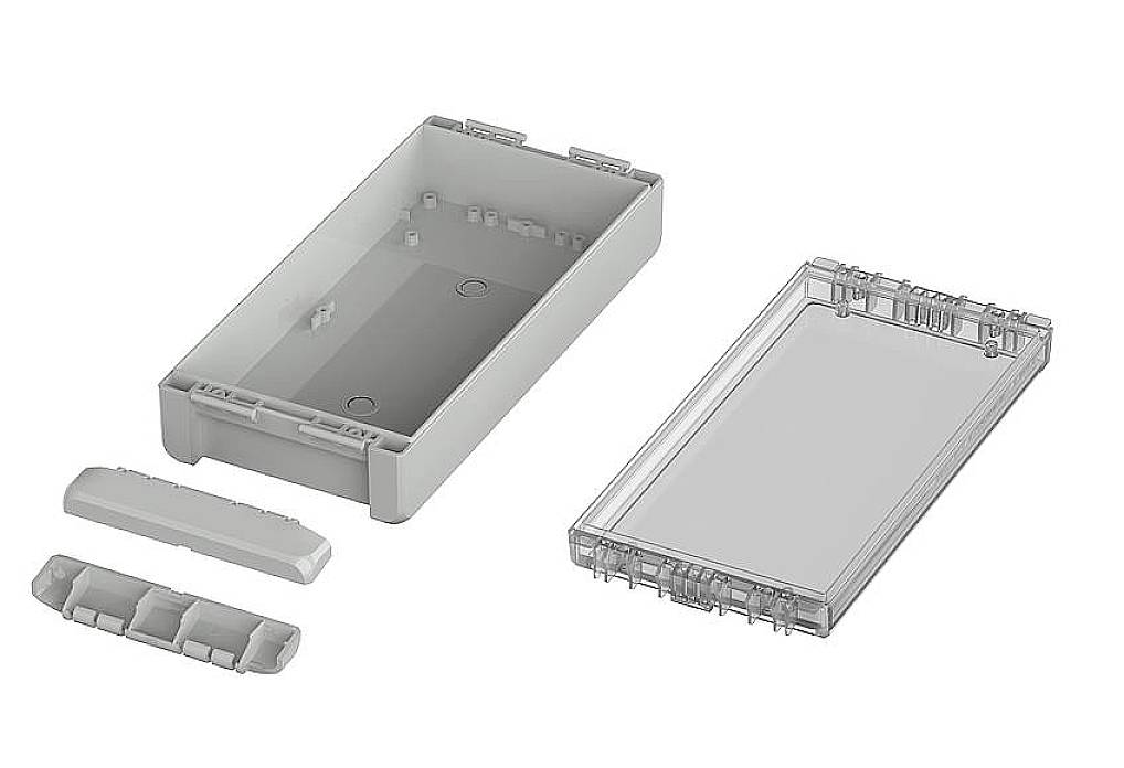 Enclosure with a transparent removable lid and two rounded sections. Suitable for electronic components or prototyping.