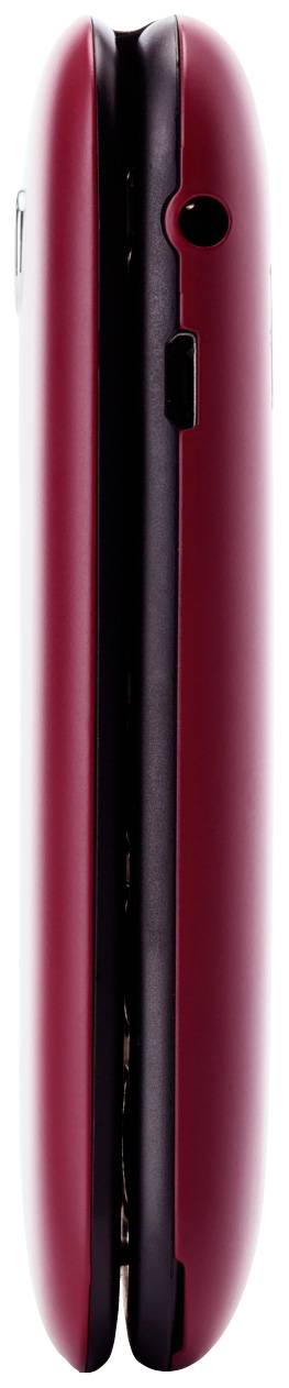 A closed, red flip phone from the side, with a visible 3.5mm headphone jack and a micro-USB port.