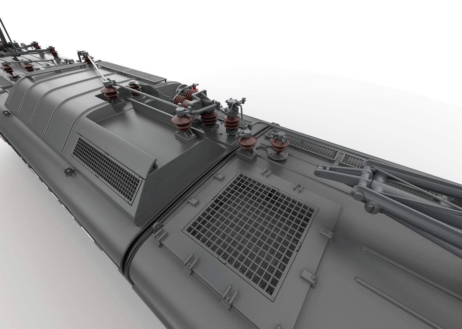 A close-up of a grey railway carriage, showing the top with ventilation grilles and insulators, against a white background.