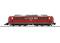 A red locomotive of Deutsche Bahn on railway tracks, side view.