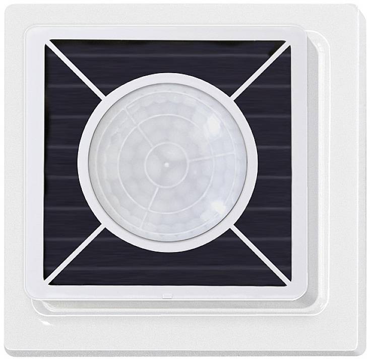 A square motion sensor with a central, round sensor and a plain white housing for ceiling mounting.