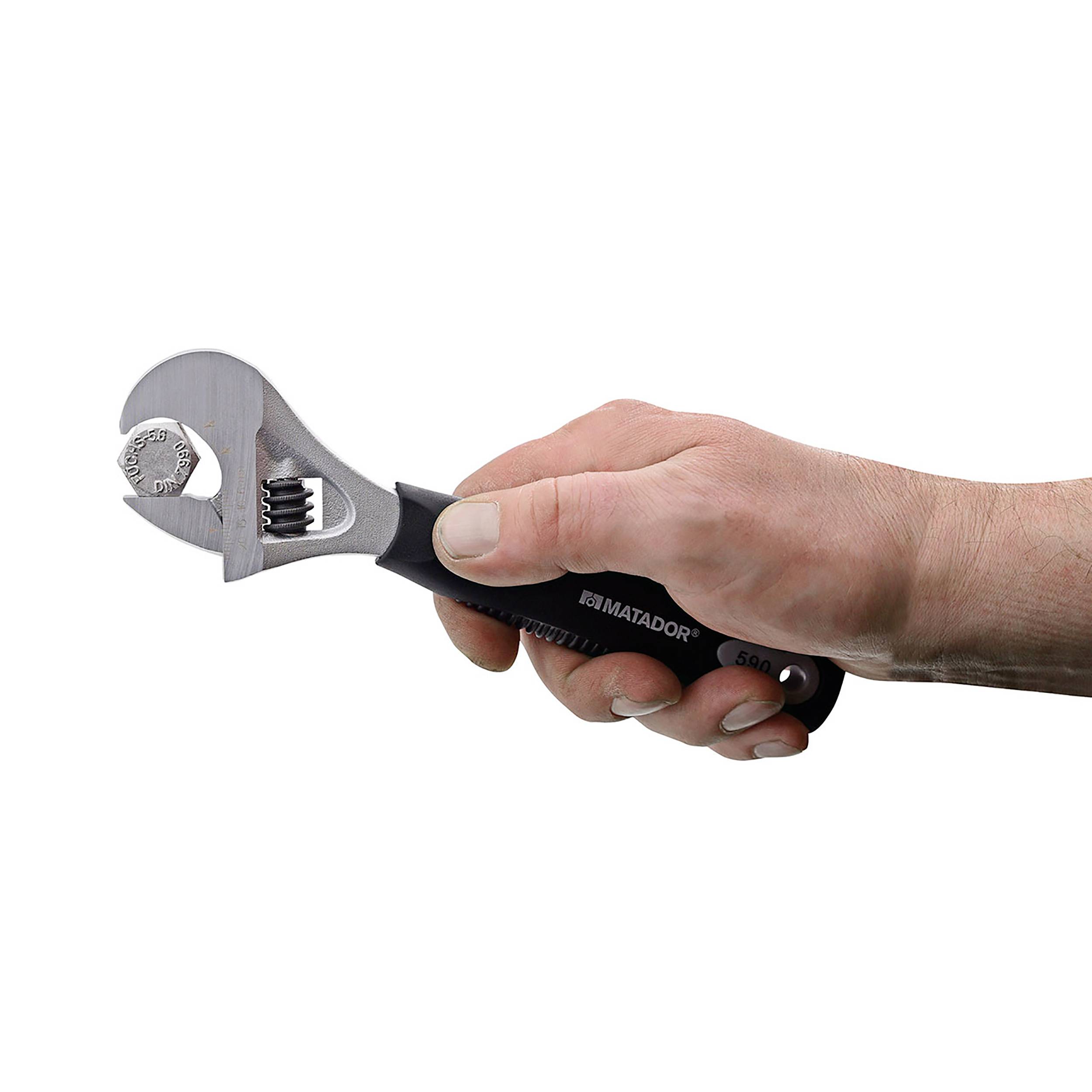 A hand holds an adjustable spanner, ready for use.