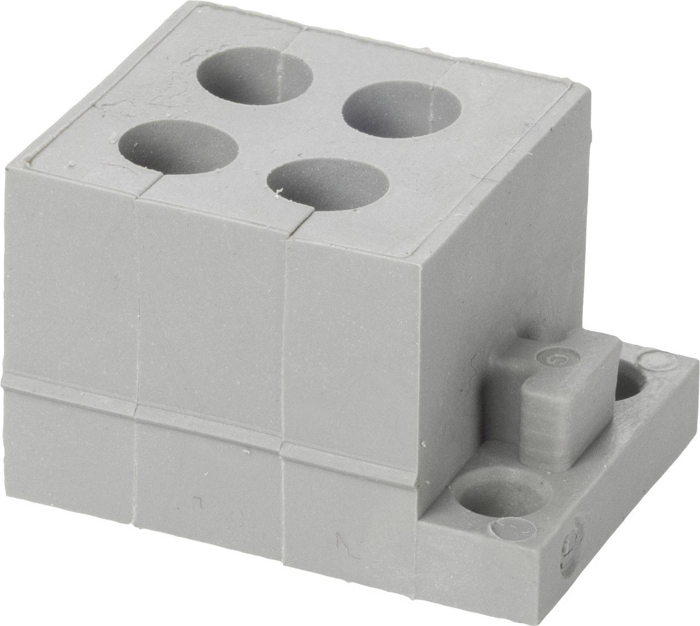 Grey building block with four round holes and a small rectangular projection on the side.