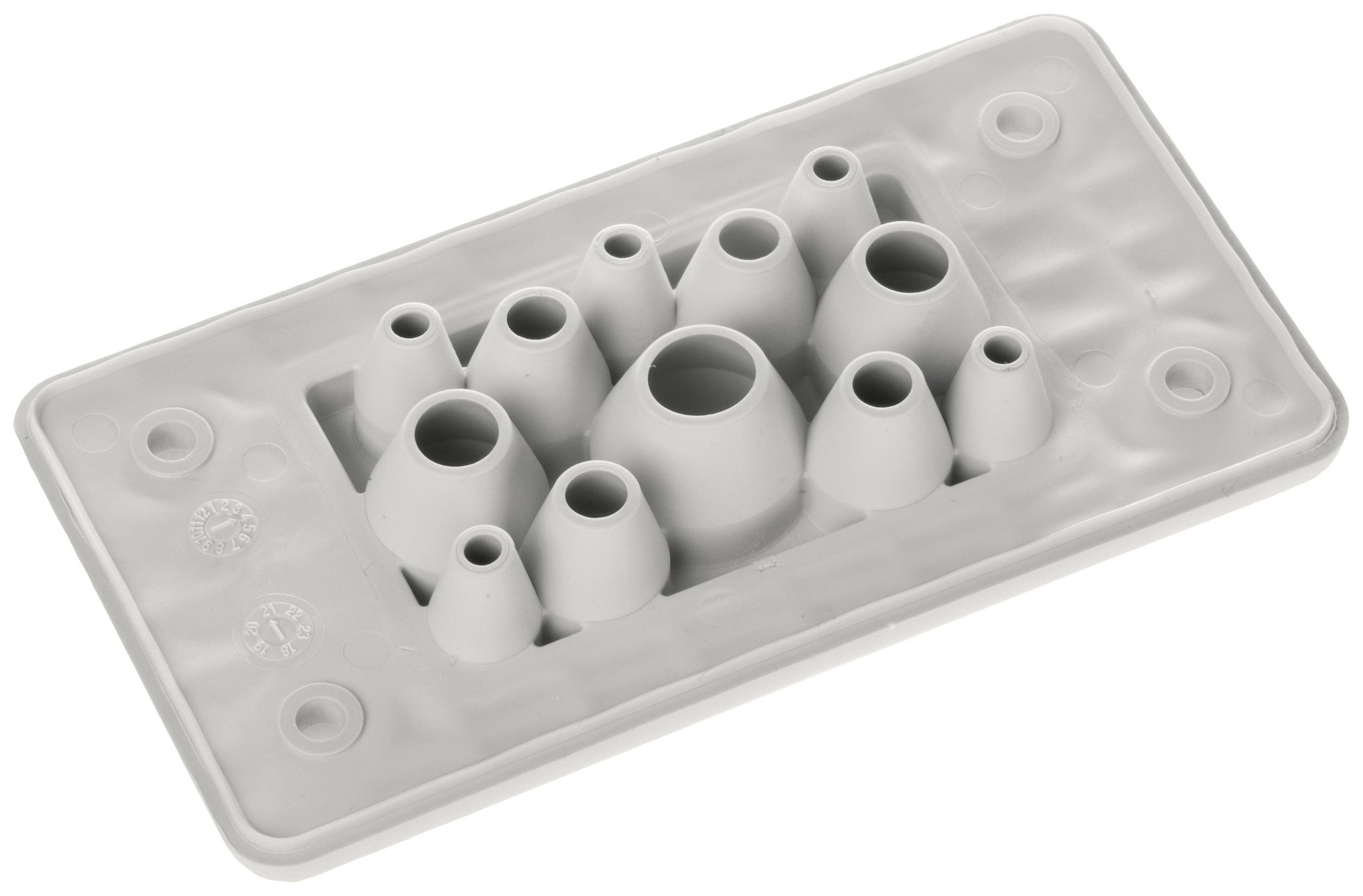 Grey adapter, consisting of multiple round inlets of varying sizes, arranged on a rectangular base.
