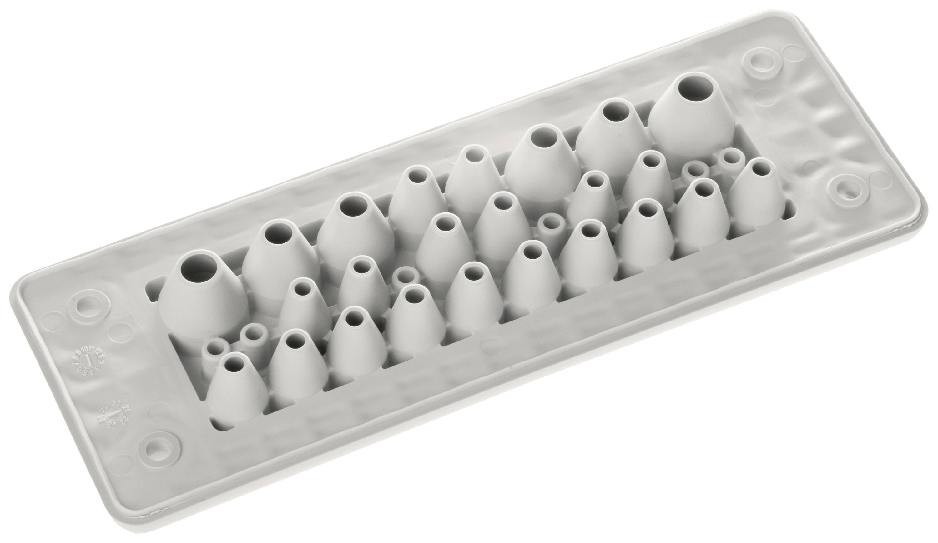 A grey cable grommet with multiple openings of varying sizes for routing cables through control panels or enclosures.