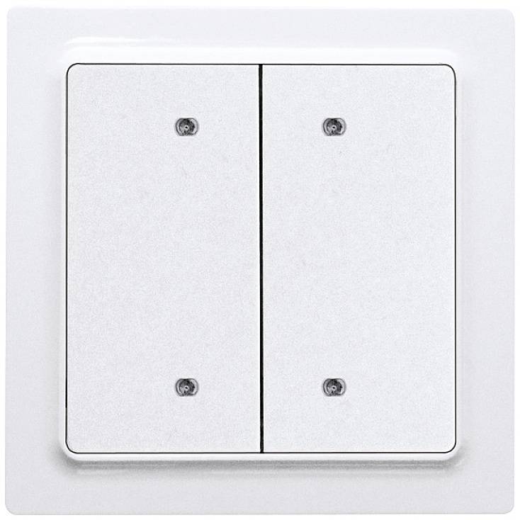 A double light switch in white on a wall, with two toggle switches for controlling separate light sources.
