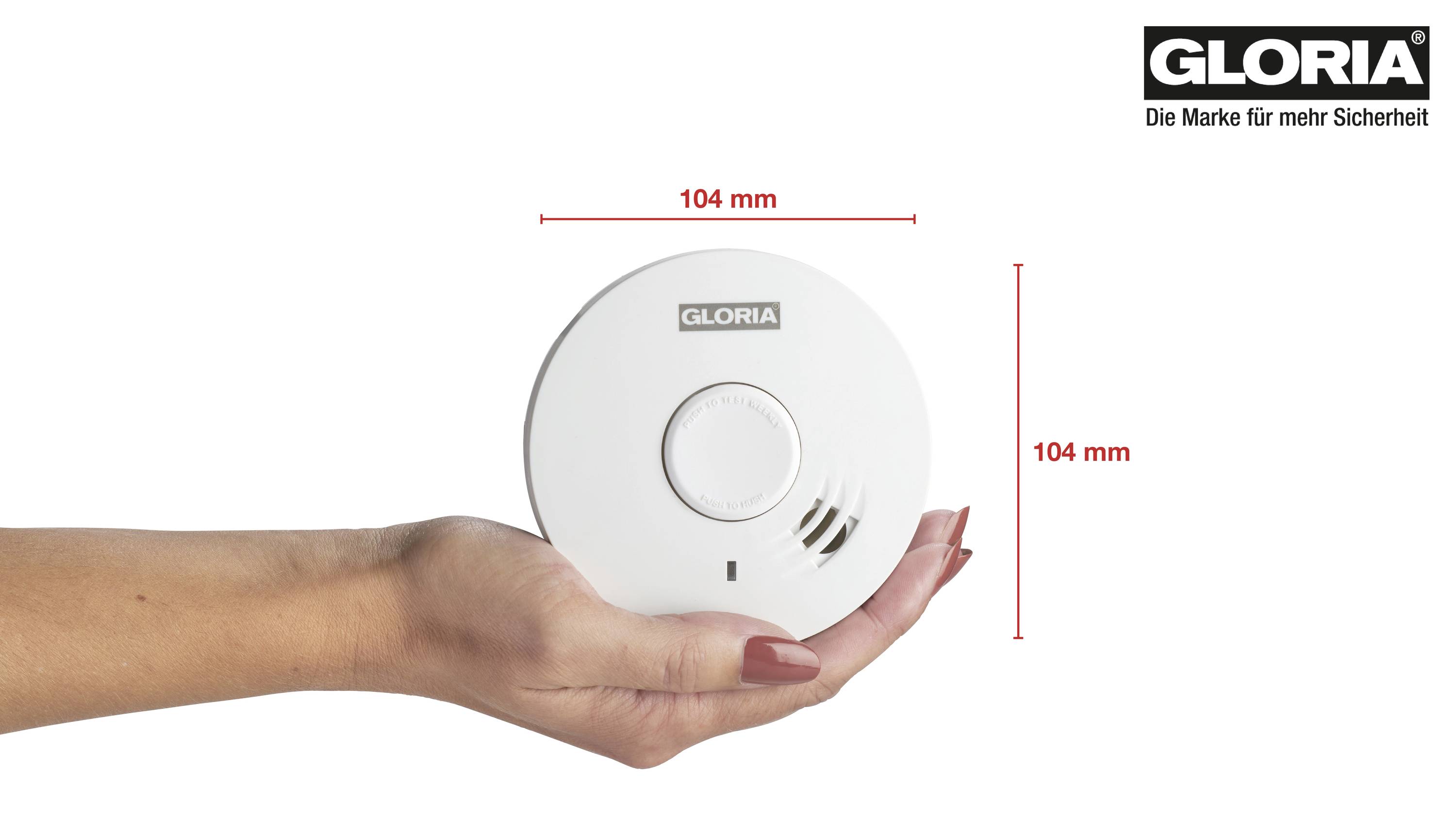 A hand is holding a round smoke detector with the 'GLORIA' logo. The diameter of the smoke detector is 104 mm. Inscription: 'The brand for more safety'.