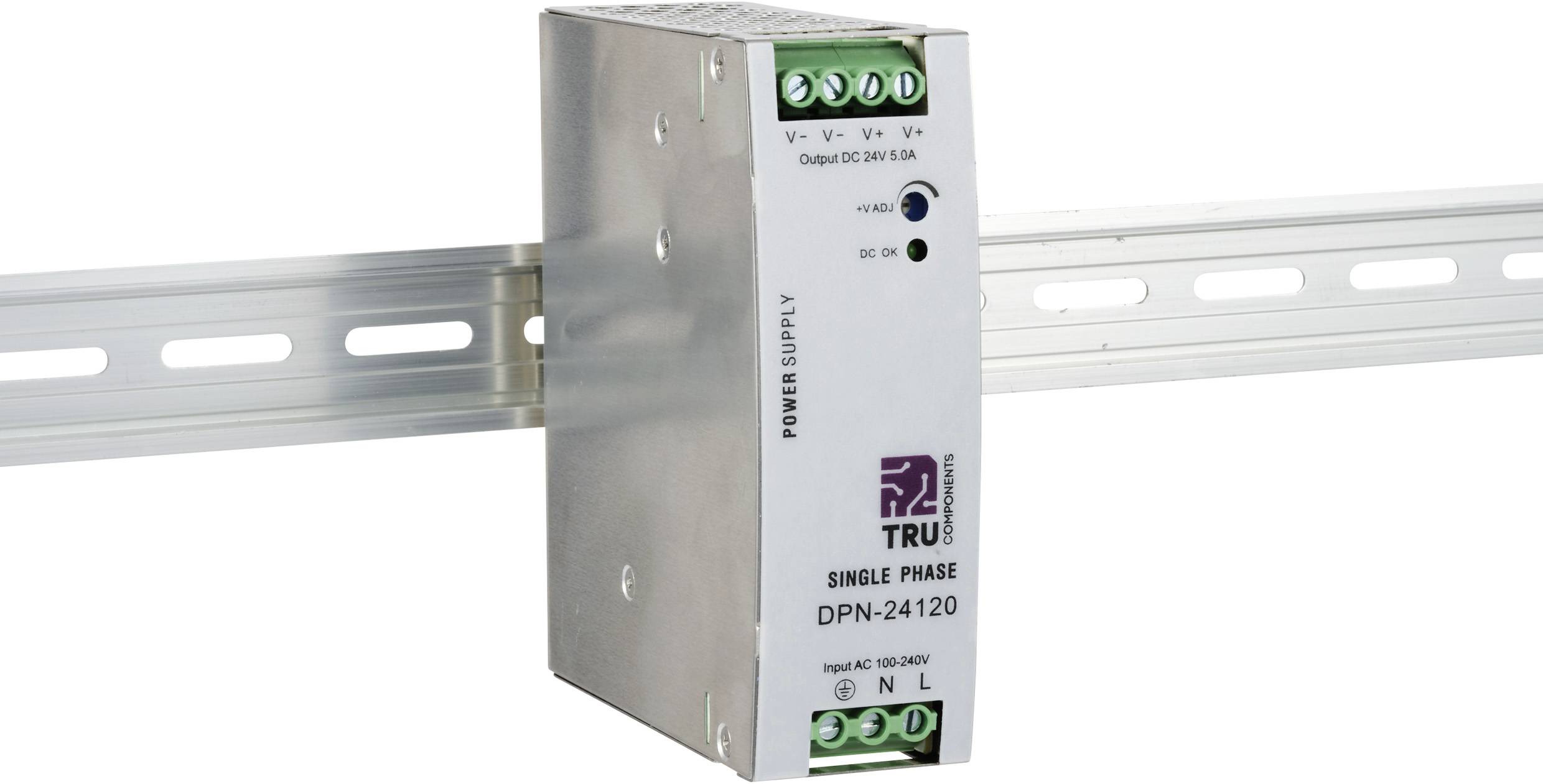 Single-phase DIN rail power supply TRU DPN-24120. Input: AC 100-240V, Output: DC 24V 5A. Silver casing, mounted on metal rail.