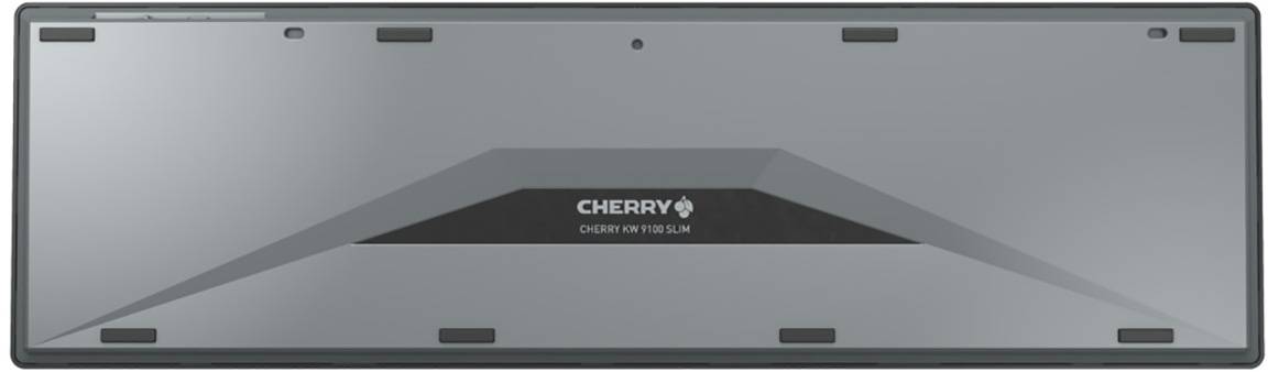 The image shows the back of a flat keyboard by CHERRY with non-slip feet and a modern design in grey and black.