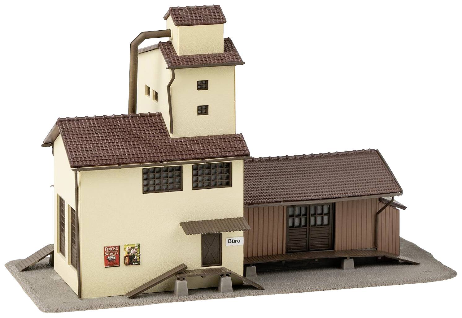 Model of a two-storey building with a red tiled roof, beige walls and a brown wooden extension, sign reading 'Office' visible.