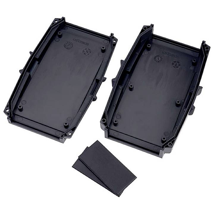 Two black plastic case halves side by side with rectangular foam inserts underneath, presumably for an electronics box.