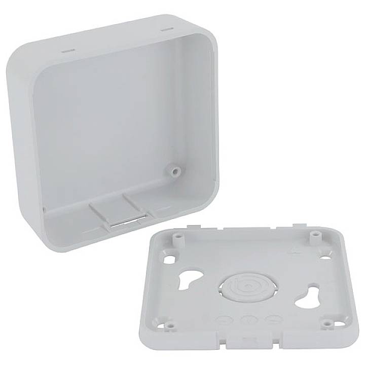 Illustrated is a grey plastic surface-mounted box with a removable front panel, suitable for electrical installations.