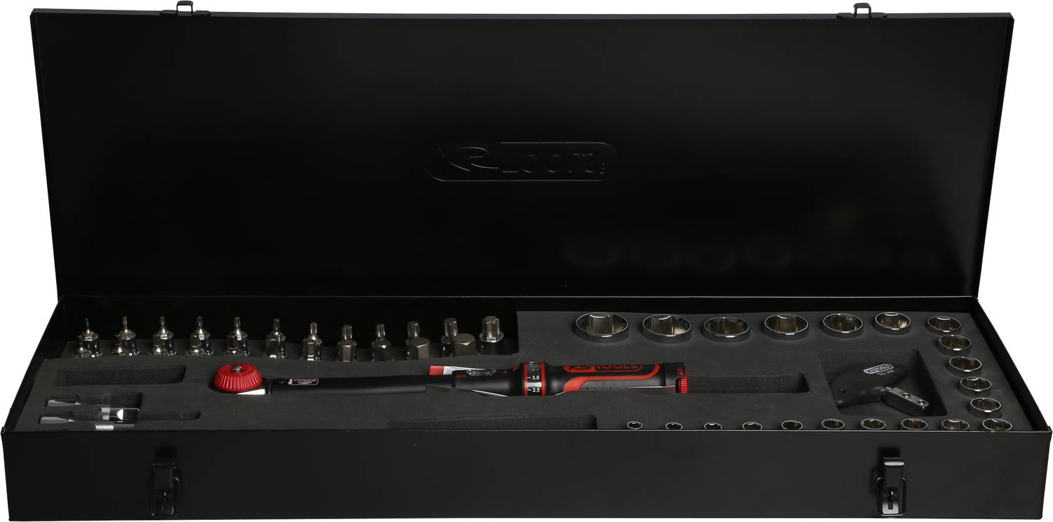 Black tool case with various socket keys, torque wrench and other tools neatly arranged.