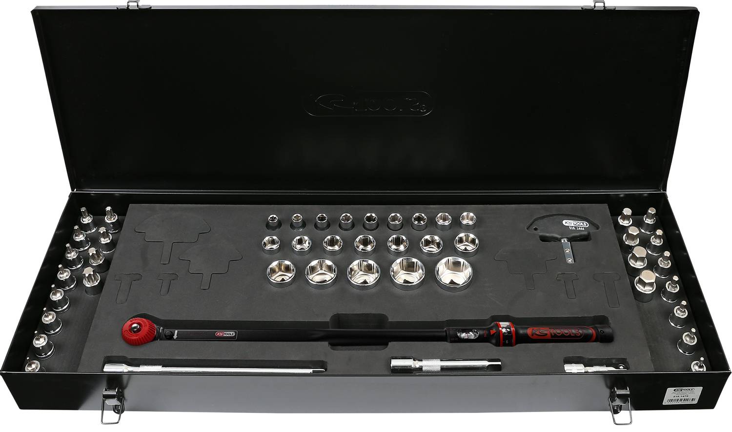 An open black toolbox with various sockets and a torque wrench, arranged on a foam base.