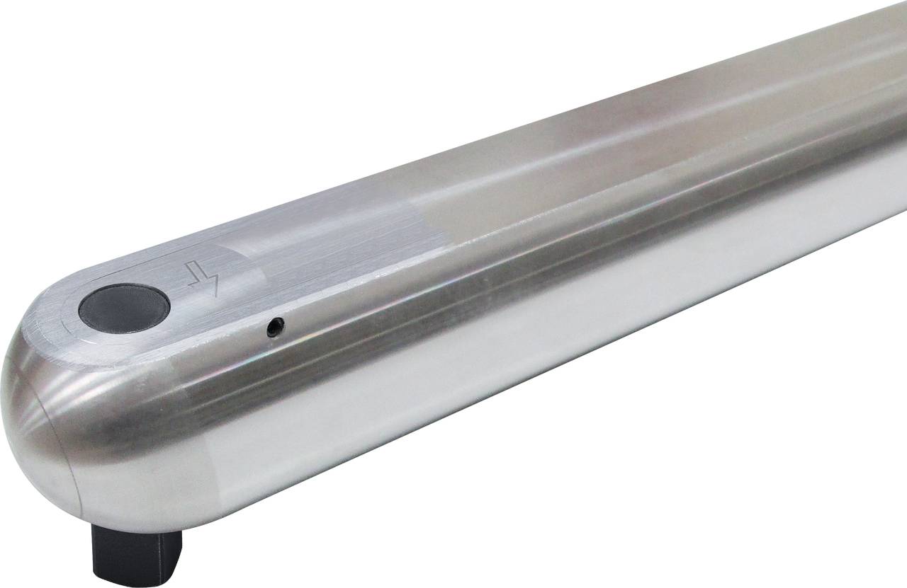 A metallic cylindrical object with rounded ends and a small opening at one end.