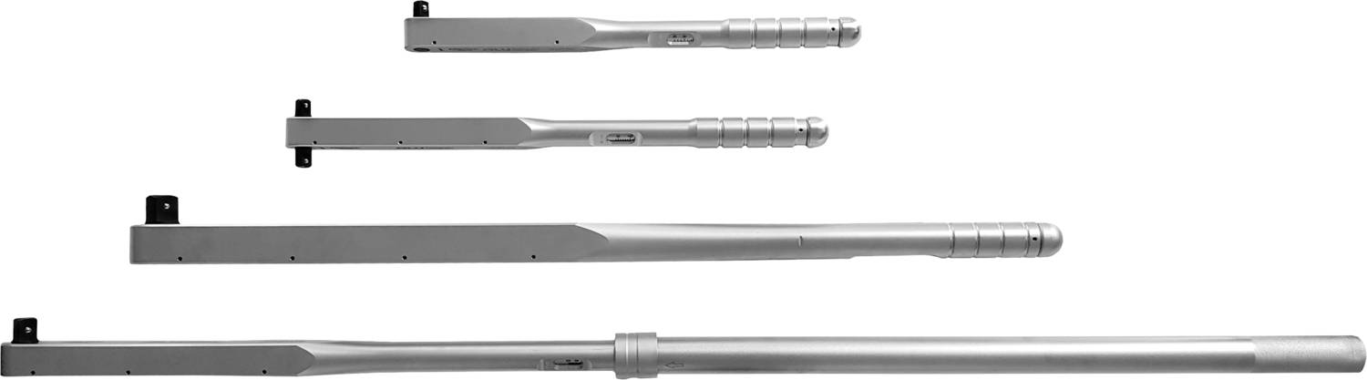Four differently sized torque wrenches arranged horizontally. All tools are silver in colour and made of metal.