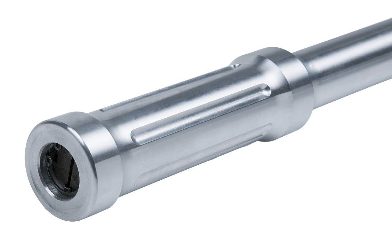 A silver metal cylinder with a ribbed handle and smooth surface, possibly part of a fitness equipment or tool.