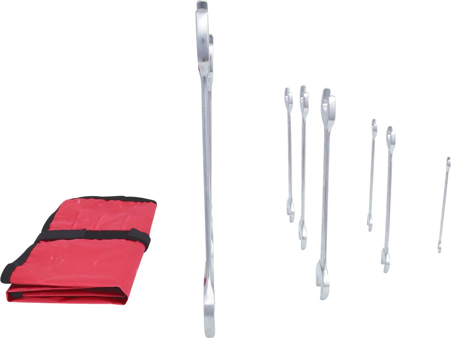 A set of spanners next to a folded red tool bag. The spanners are in various sizes.