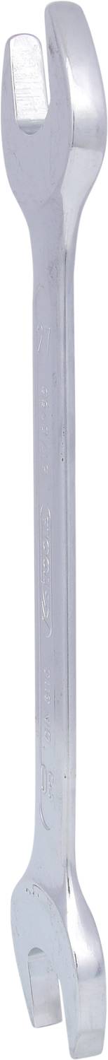 Silver spanner with open ends on both sides; tool used for tightening or loosening bolts and nuts.