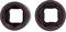 Two black cylindrical objects side by side. Each displays an inner, red-bordered, pentagonal shape with a square opening.