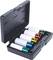 Tool kit with five coloured socket plugs in white, green, blue, yellow and red, together in a black, open hard case.
