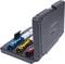 A black transport case contains three spanners in blue, yellow and red.<br><br>Note: In British English, a "Schraubenschlüssel" is typically referred to as a "spanner" rather than a "wrench", which is more commonly used in American English.