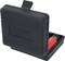 Black plastic case with red bottle, possibly containing a tool set.