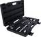 An opened tool case with a spanner set, sockets and extension bars on a dark foam background.
