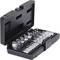 An open black case containing a set of silver screwnut and bit attachments, arranged by size.