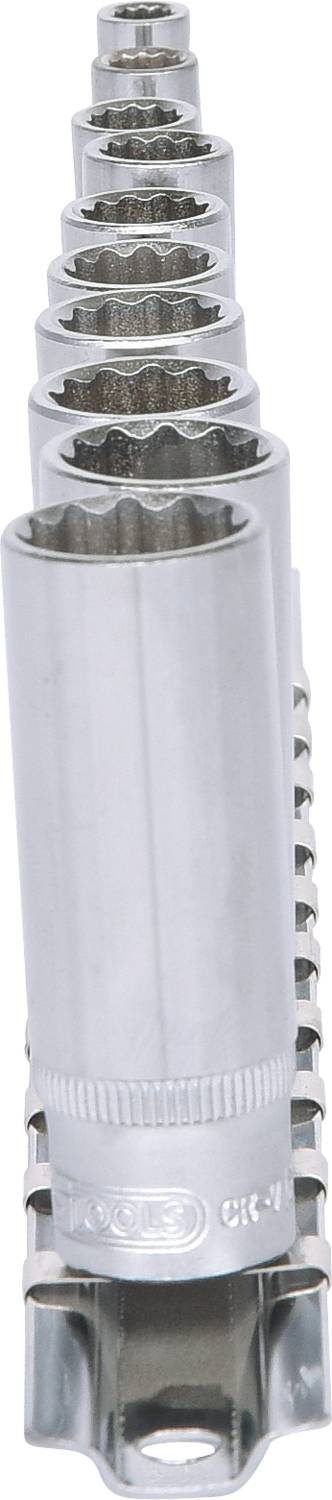 A row of silver drawing pins of varying sizes, arranged in a line.