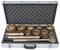 'Metal case opened, revealing golden specialist tools in various sizes, securely stored in foam inserts, organised for transport.'
