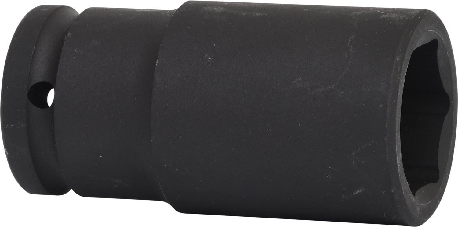 A black, cylindrical metal canister with an opening at one end and a small lateral hole.