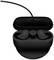 Black wireless earbuds in an open charging case, resting on a wireless charging pad.