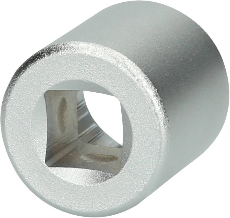 A silver ratchet extension, cylindrical with a square internal opening, is used for socket keys and torque wrenches.
