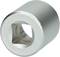 A silver ratchet extension, cylindrical with a square internal opening, is used for socket keys and torque wrenches.