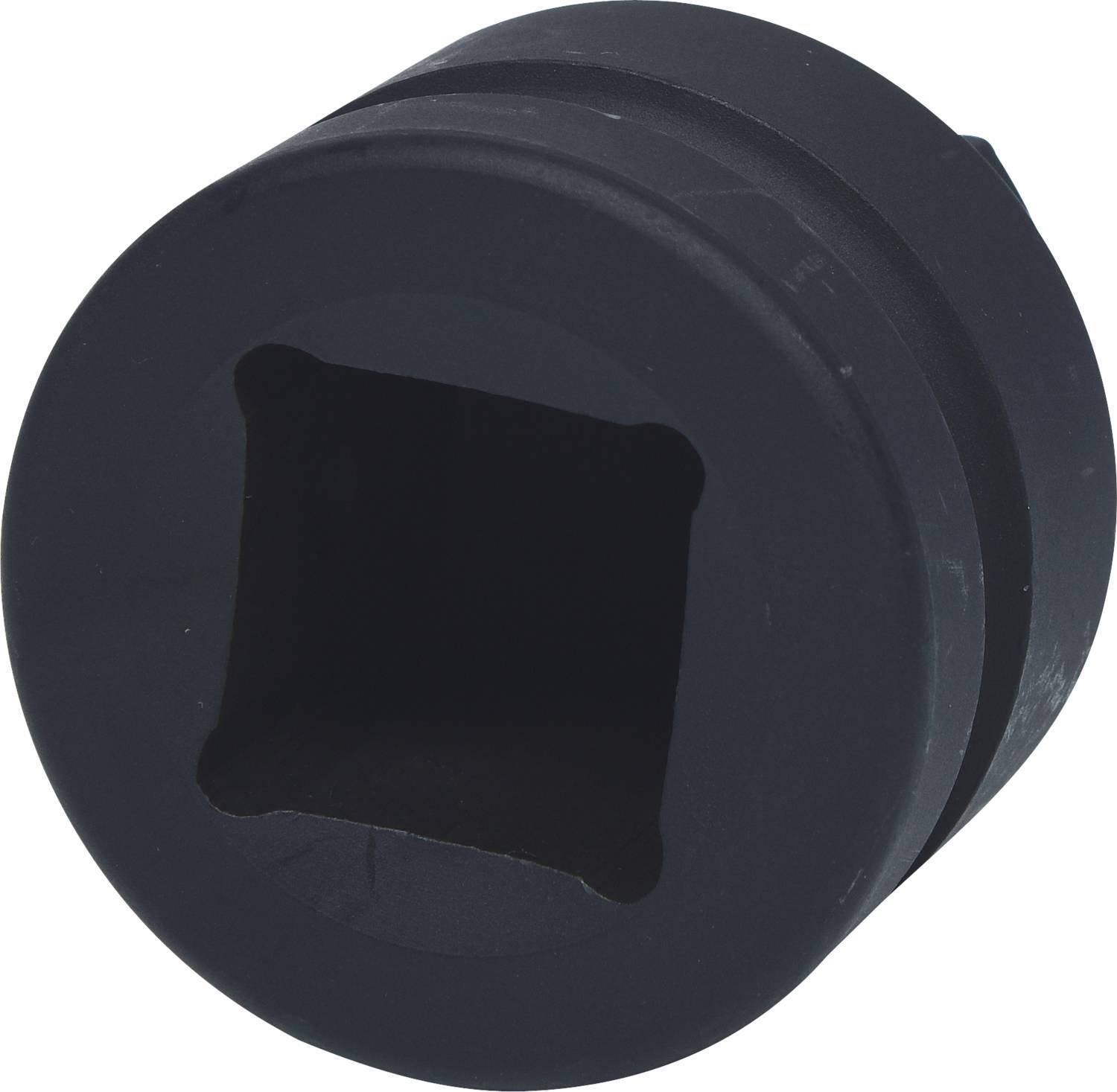 Black, cylindrical metal sleeve with a square cut-out in the centre.