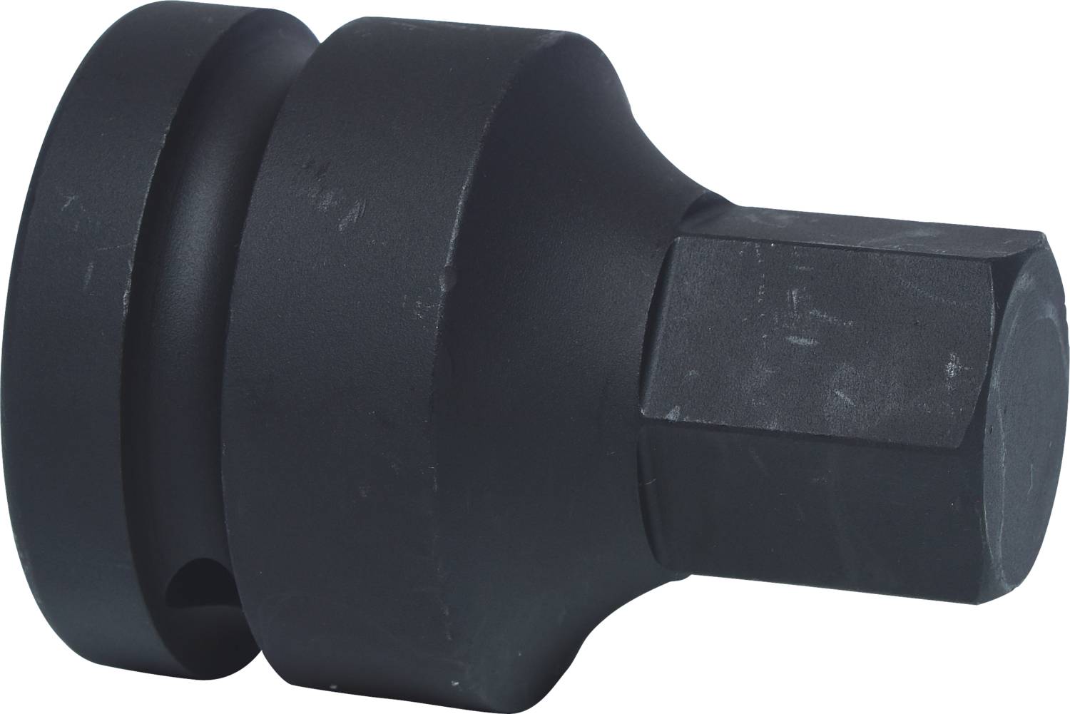 Black, round tool with a hexagonal end, likely an adapter or insert for mechanical work.