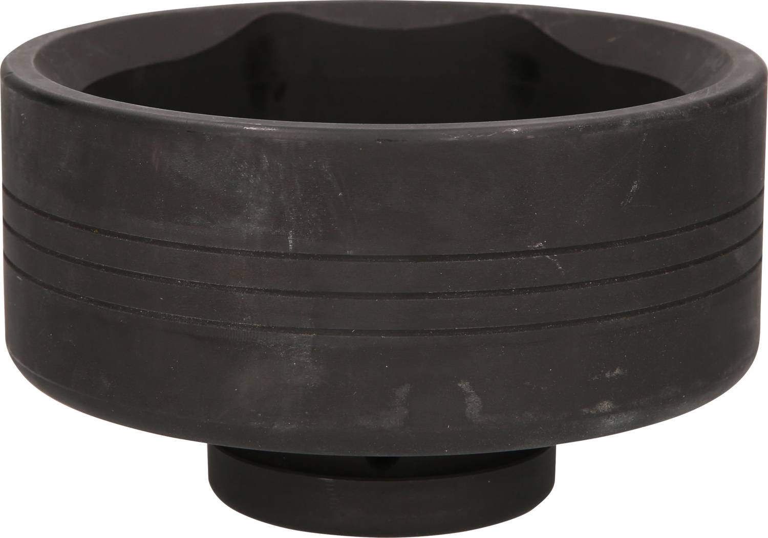 Black plastic casing with thick walls and a ribbed exterior. It is designed for use as a holder or base for technical equipment.